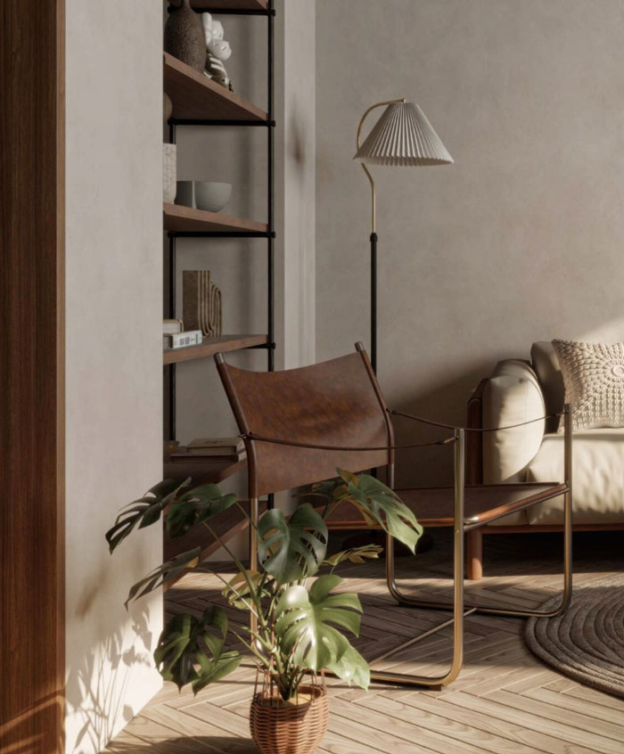 Brown chair with plant and lamp near it 