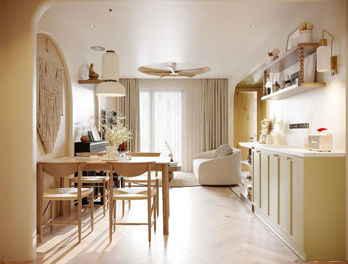 Boho decor dining space with wooden table and green kitchen cabinets creating a chic and cozy atmosphere. Boho decor dining space with wooden table and green kitchen cabinets creating a chic and cozy atmosphere.