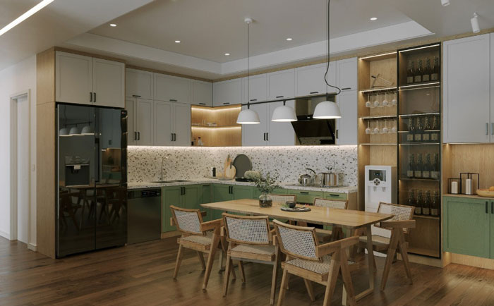 A kitchen with green and white kitchen cabinets and wooden dining table with chairs 