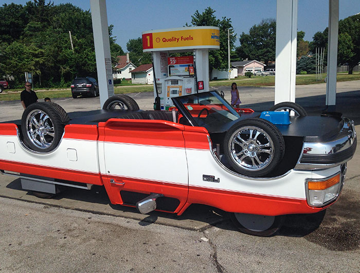 I Saw This Car Filling Up At A Gas Station In Illinois And Did A Double Take. The Top Tires Spin Too