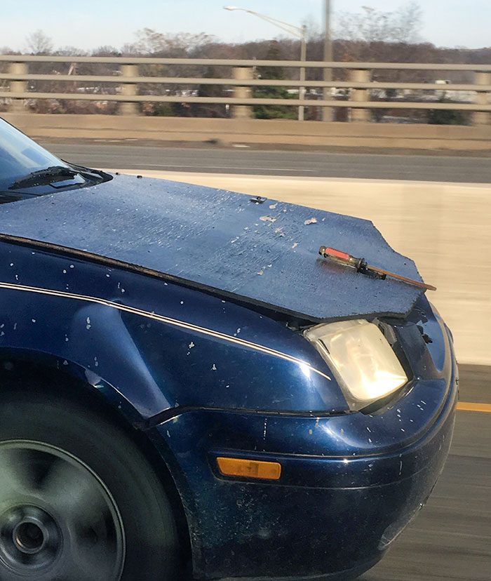 Florida Car With A Plywood Hood And A Screwdriver Ornament