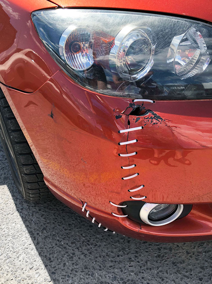 This Car Using Cable Ties As A Suture For A Torn Bumper