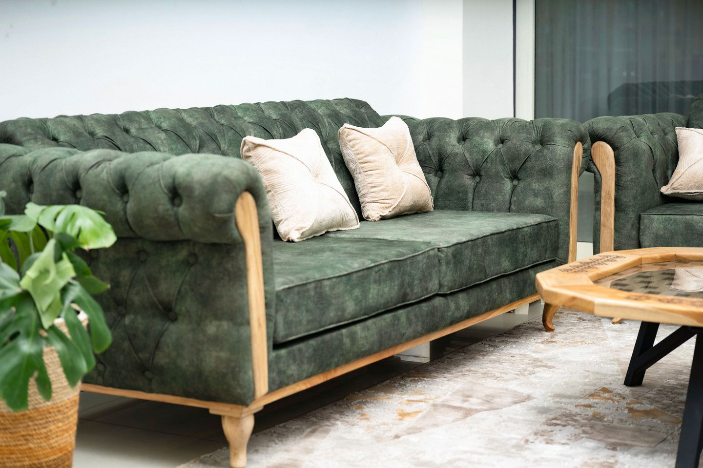 Wood frame sage green two-seater couch
