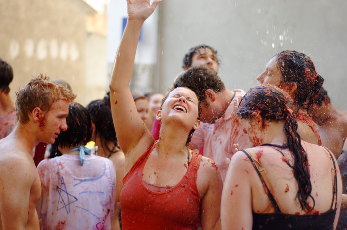 People having fun at 'La Tomatina' festival in Buñol, Spain