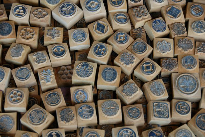 Many small blue 'hanko' stamps