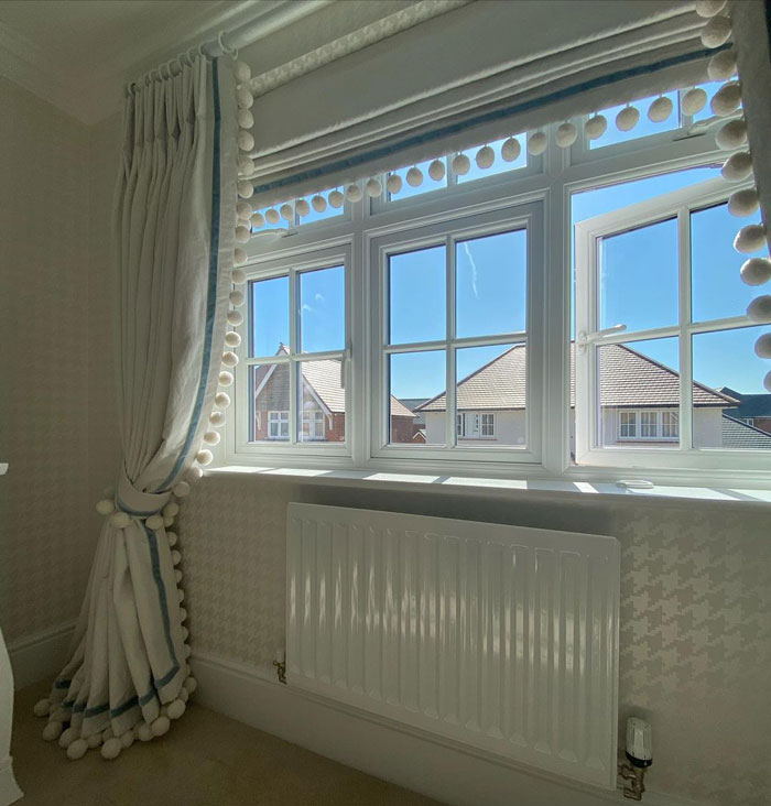 curtains on the window with pom pom tassels curtains on the window with pom pom tassels