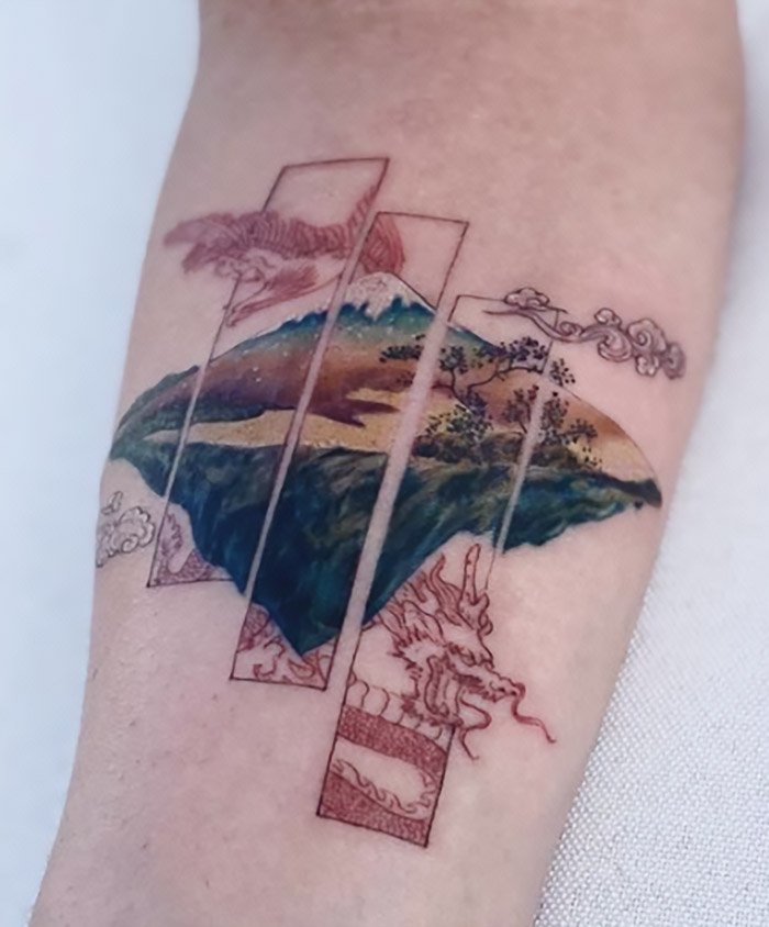 Island and dragon colorful arm tattoo