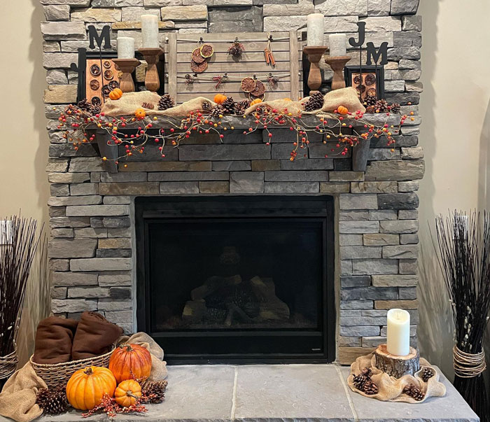 Stone fireplace with Halloween decorations