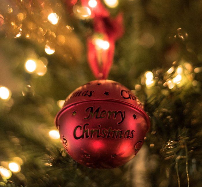 Red Christmas ornament hanging on the Christmas tree