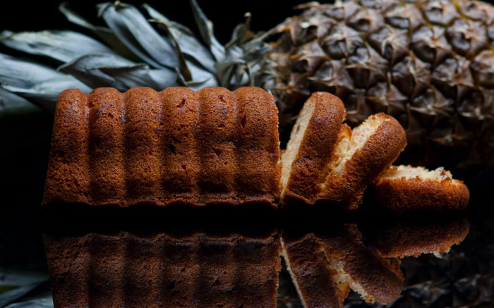 Cutted cake on a glass surface 