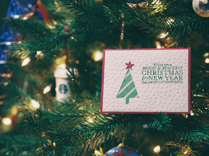 A Christmas card on the Christmas tree 