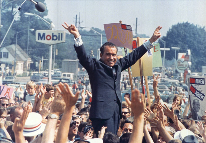  Richard Nixon flashes his iconic "victory" sign in Paoli, PA during his triumphant presidential campaign