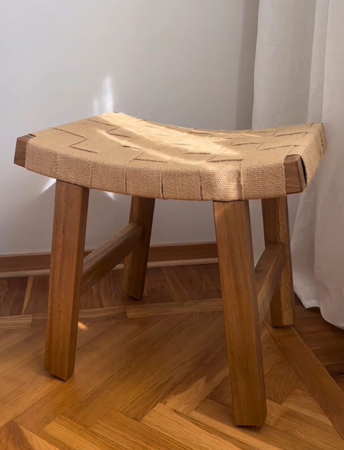 Brown DIY home decor chair with woven seat on wooden floor, adding natural warmth to living room design ideas. Brown DIY home decor chair with woven seat on wooden floor, adding natural warmth to living room design ideas.