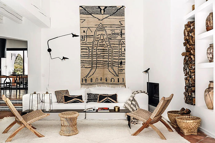 Spacious bright living room with natural materials, woven furniture, and stylish home decor ideas reflecting modern design trends. Spacious bright living room with natural materials, woven furniture, and stylish home decor ideas reflecting modern design trends.