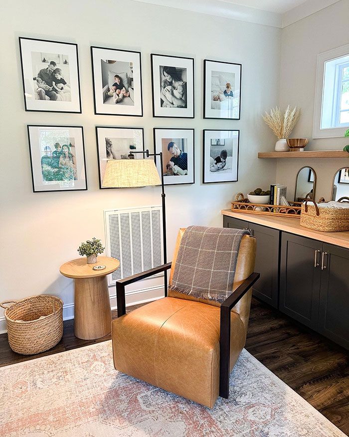 Living room corner with framed pictures, leather chair, and stylish home decor ideas blending comfort and modern design. Living room corner with framed pictures, leather chair, and stylish home decor ideas blending comfort and modern design.