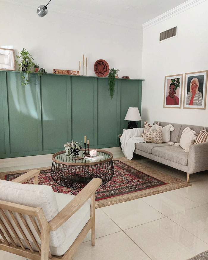 Scandinavian style living room with green accent 