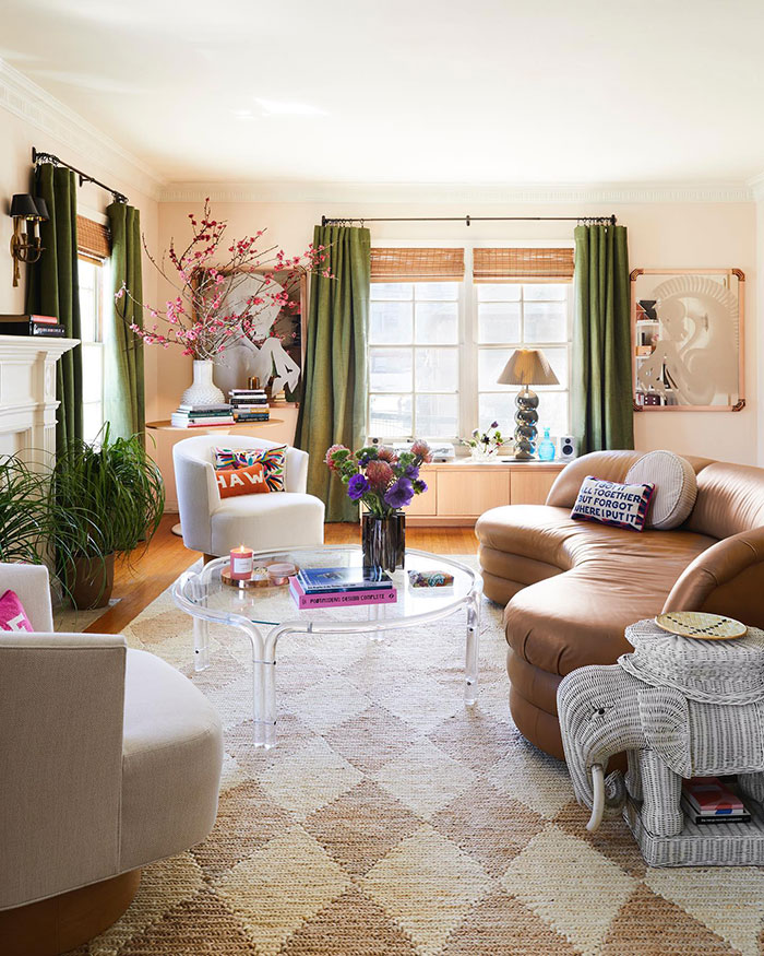 Electric and vibrant colorful living room with eclectic furniture, green curtains, and designer-inspired home decor ideas. Electric and vibrant colorful living room with eclectic furniture, green curtains, and designer-inspired home decor ideas.