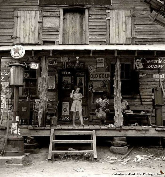 Daughter Of White Tobacco Sharecropper At Country Store. Person County, North Carolina. July, 1939