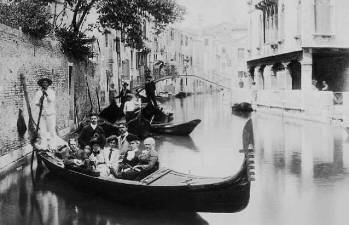 Tourists Pose In A Gondola In Venice, Italy, 1900s