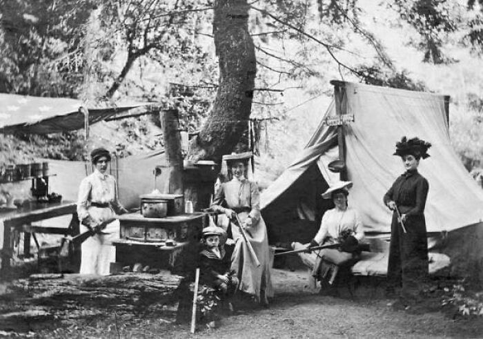 Four Women Armed With Rifles And A Young Boy Camping In 1890