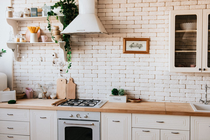 whitewashed brick wall in the kitchen