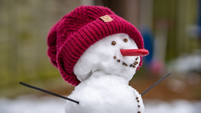 Snowman with red hat