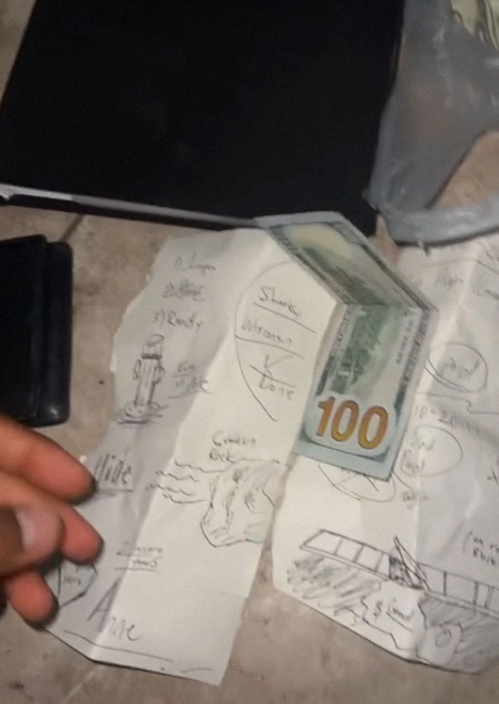 Person Goes Viral After Finding A "Sketchy" Stash Of Money Buried In The Sand