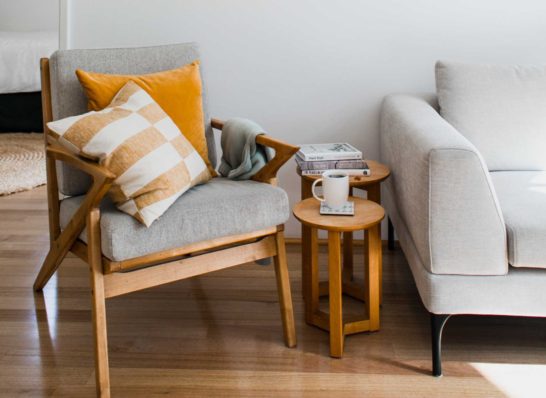 living room with sofa and armchair