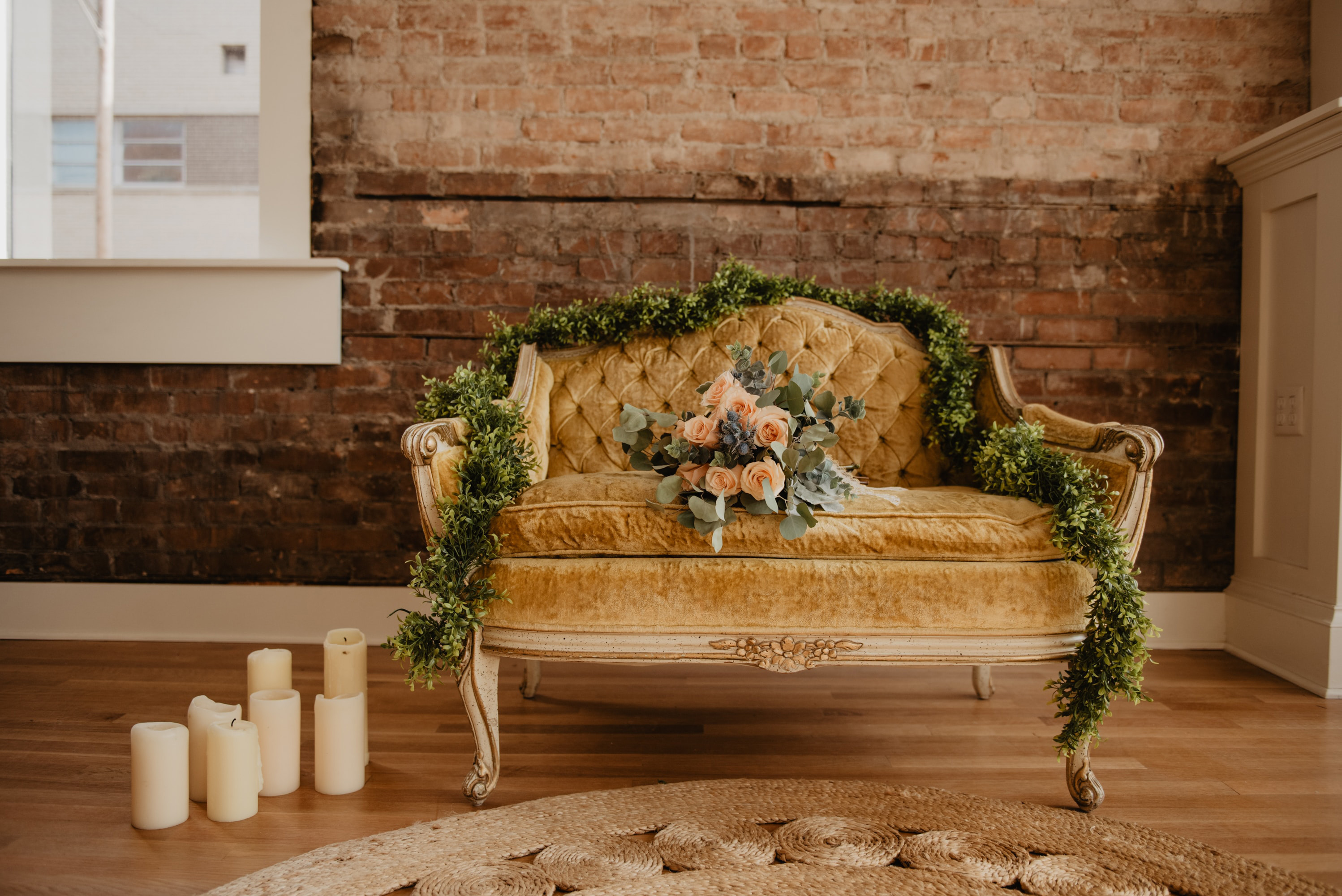 velvet vintage loveseat chair near the window