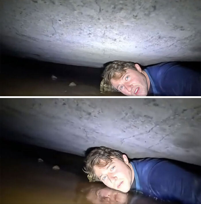 Espeleólogo atascado en una sección de una cueva parcialmente sumergida