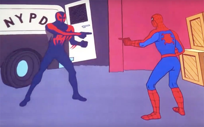 Two Spiderman characters pointing at each other in a classic meme scene, standing in front of an NYPD truck.