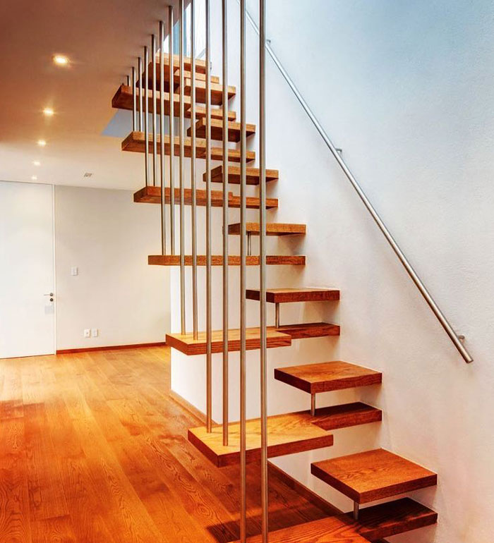 wooden alternating-tread stairs with metal railings