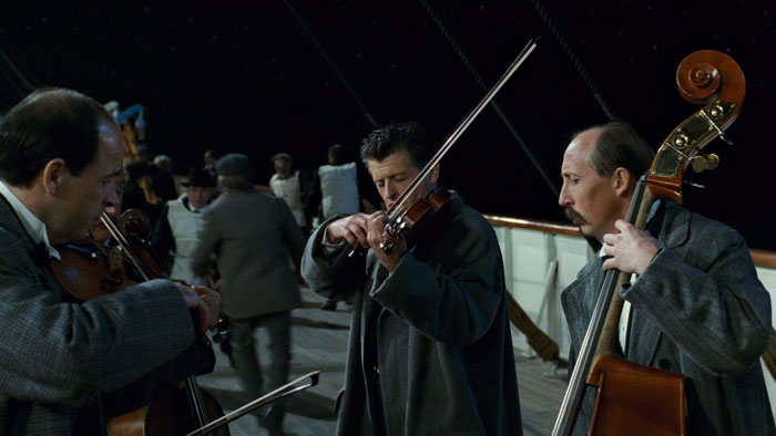 Musicians performing the last song while the Titanic is sinking in the 'Titanic' (1997) movie 