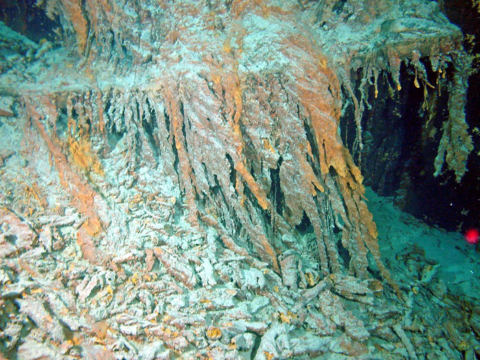 Part of the Titanic wreck in 2003 with rusticles hanging from the hull