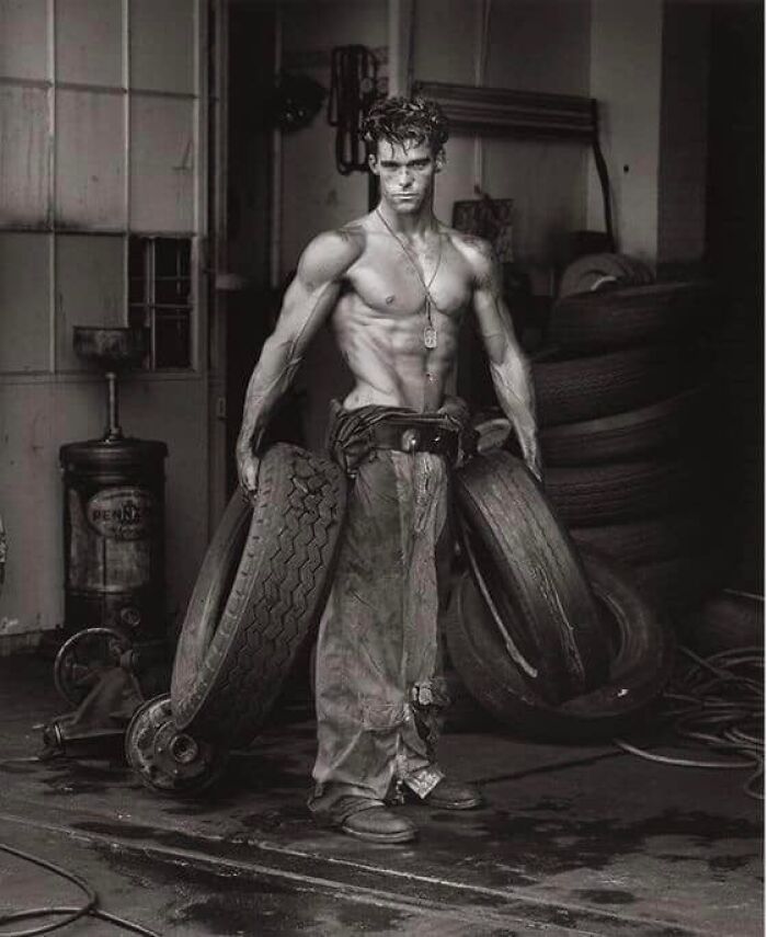 Fred With Tires From The Body Shop Series, 1984 By Herb Ritts