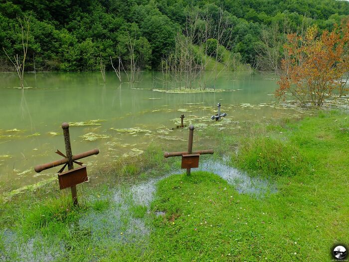 A Flooded Cemetery In The Abandoned Village Geamăna In Romania