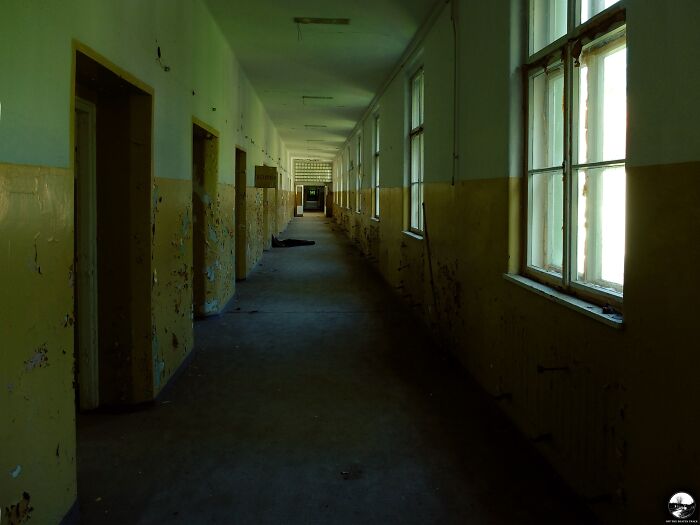 An Eerie Corridor In An Abandoned Hospital In Poland