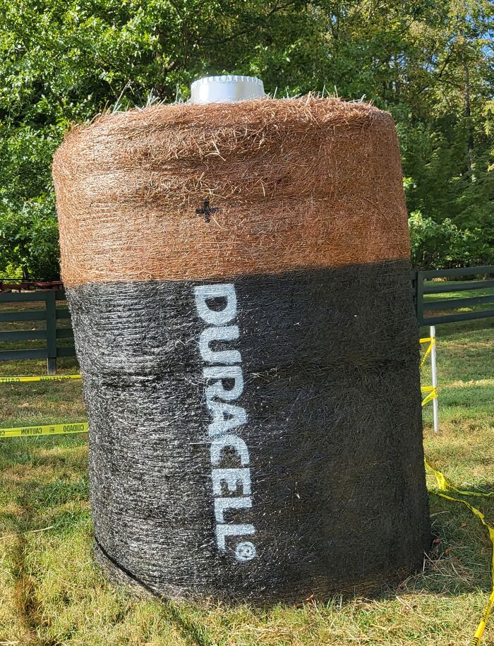 Giant hay bale of a Duracell battery