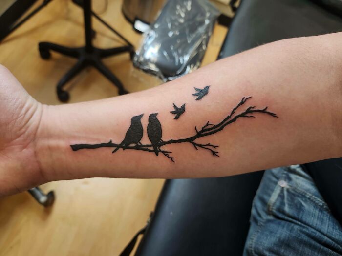 two birds on the branch memorial tattoo