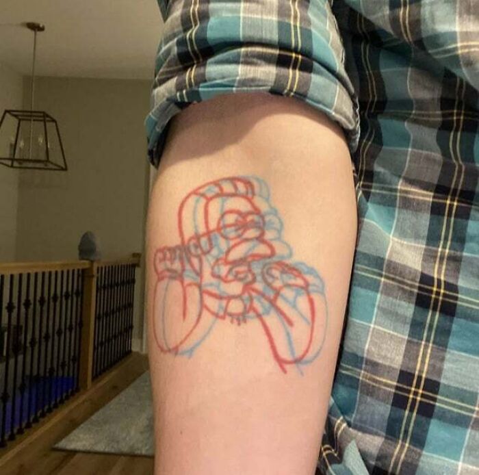 Ned Flanders Purple Drapes arm tattoo