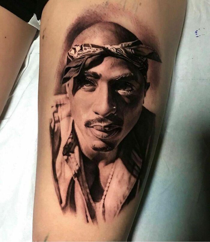 2 Pac portrait leg tattoo