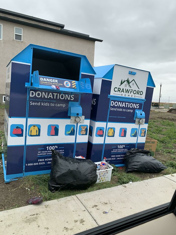 Donation Bin Being Used As Dumpster