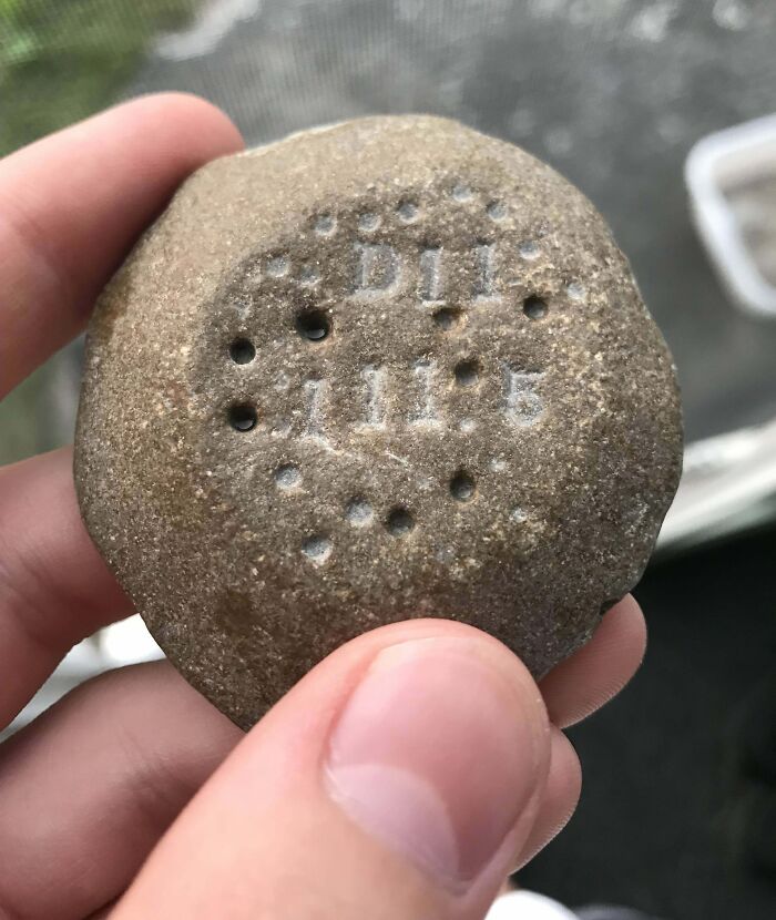 Found This Stone On A Beach In Northern LP Michigan, It’s About 2 Inches Across And Is Strangely Light For Its Size. The Holes On Top Look Man-Made