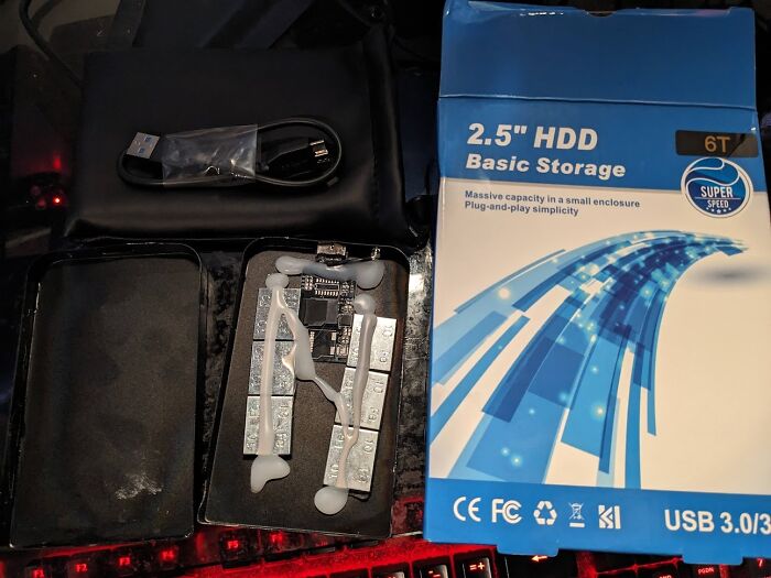 Bought A 6tb Hdd On Ebay, Got A Tiny Sd Card And 60 Grams Of Iron Weights In A Plastic Case