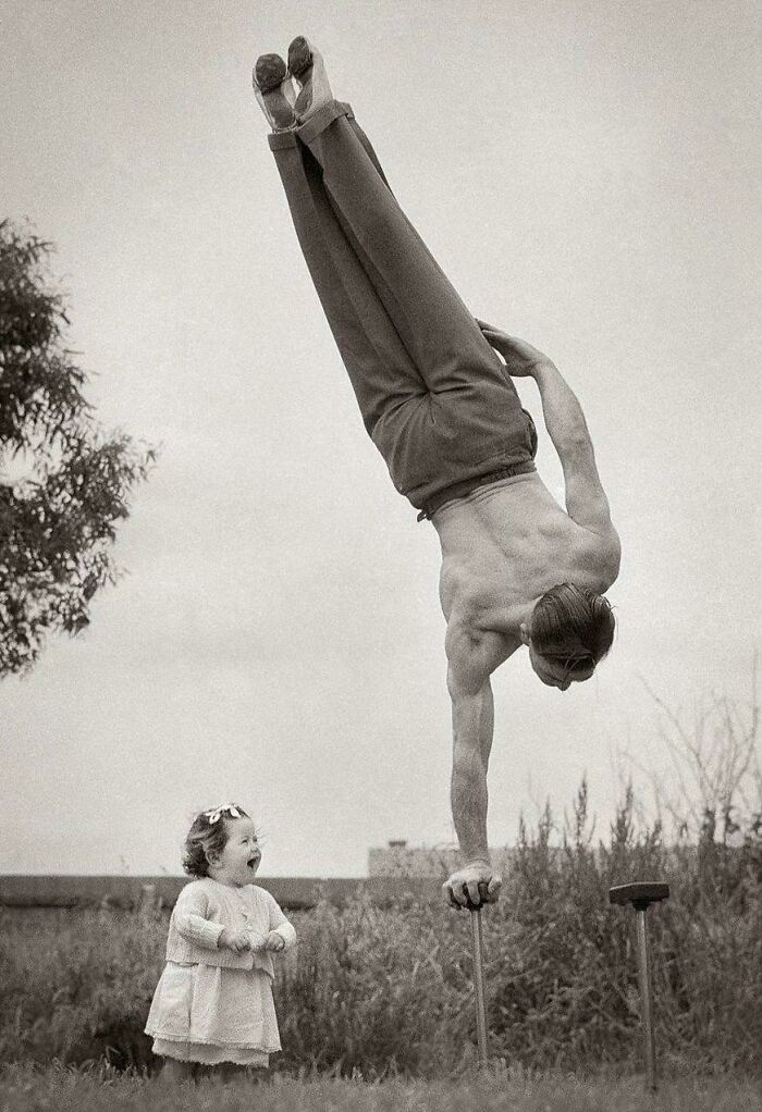 Little Girl Is Thrilled By Her Dad's Amazing Balancing Act In Melbourne, Australia - C.1940 