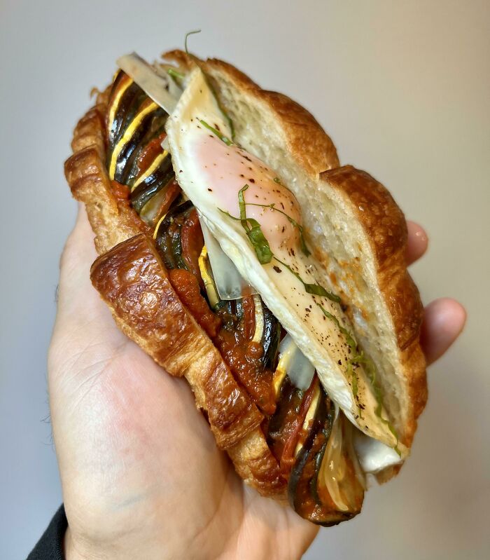 Ratatouille Breakfast Sandwich With Egg And Gruyère In Toasted Croissant
