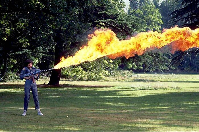 Sigourney Weaver Testing Out A Flamethrower While Filming Alien