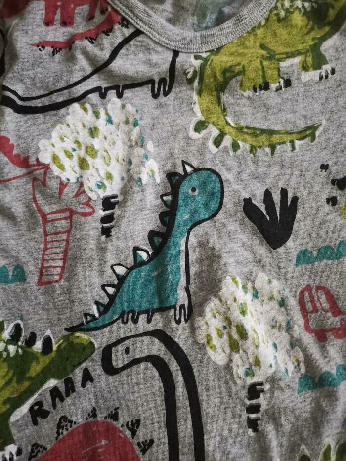 Found A Dino With Five Legs On My Kid's Shirt