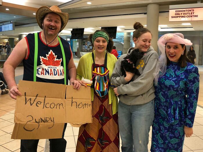 We Decided To Embarrass Our Daughter At The Airport After 3 Months Away (We Don't Normally Dress This Way)