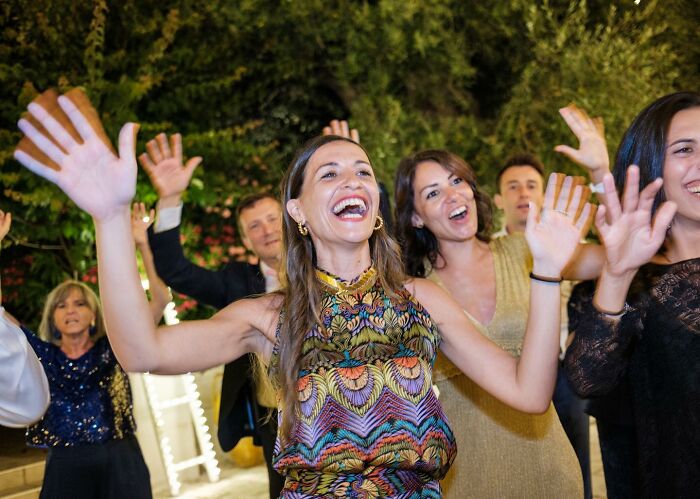 A Photograph Of People Celebrating